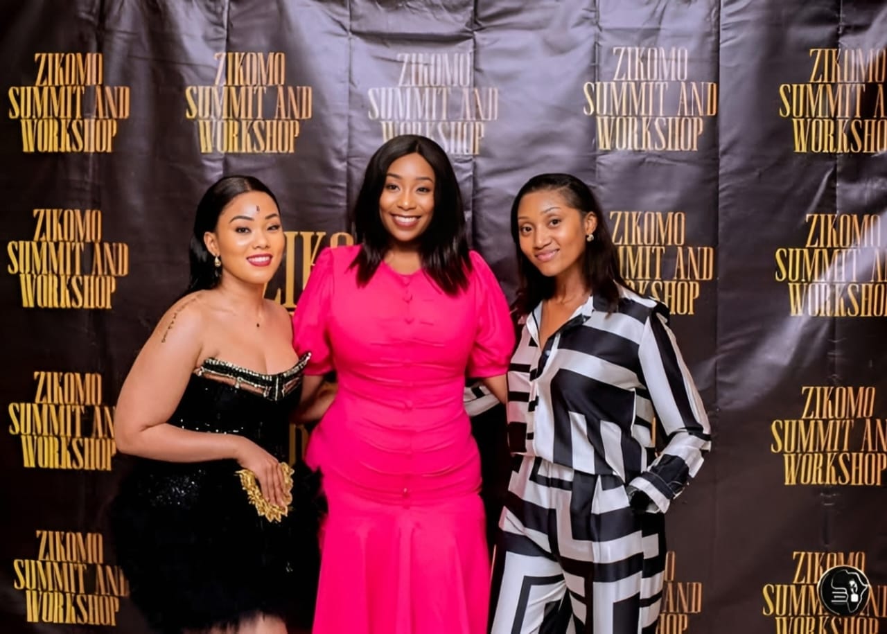 A SheReign Africa portrait captured in front of the summit backdrop