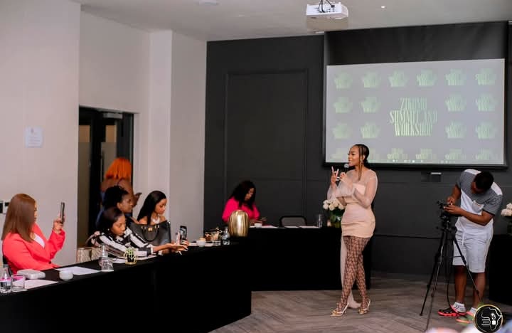 A full-room summit session at SheReign Africa